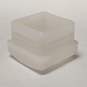 Staged view of GL2160-WHITE white plastic glide for metal frame restaurant chairs and bar stools