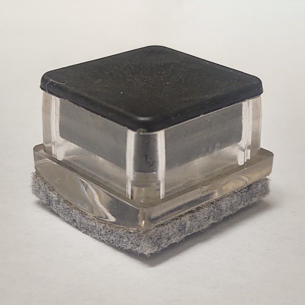 Staged view of GL2160-FELT clear plastic glide with protective felt for metal frame restaurant chairs and bar stools