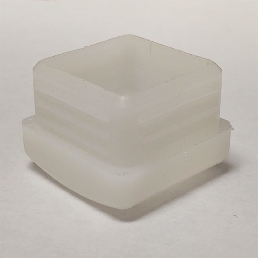 Staged view of GL2160-WHITE white plastic glide for metal frame restaurant chairs and bar stools