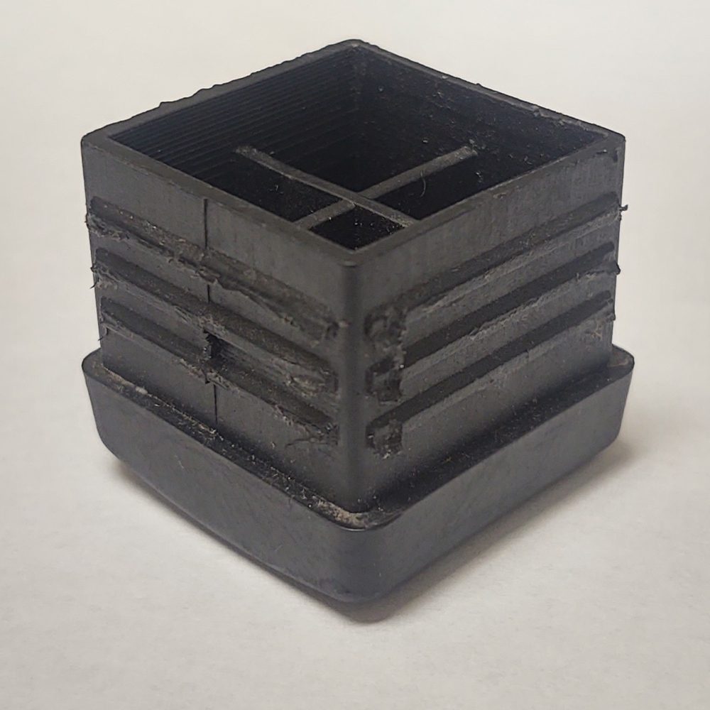 Staged view of GL234 black plastic glide for metal frame restaurant dining chairs and bar stools
